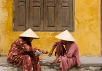 Ladies on Hanoi sitting on the sidewalk, Vietnam