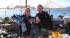 Two divers with their equipment ready to take the plunge
