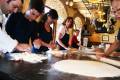 An On the Go group enjoying a cooking lesson
