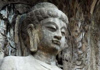 A stone carving at the UNESCO-Listed Longman Caves in Luoyang seen on a number of our China Tours.