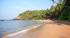 A beautiful beach in Kerala with lots of palm trees