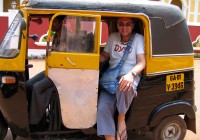 A man in an Indian Tuk Tuk
