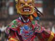 A colourful and lively masked dancer in Paro - photo courtesy of Tourism Council of Bhutan