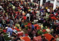 Bustling fruit and vegetable stalls at the Chichi markets in Mexico - Photo courtesy of Aunt Jojo