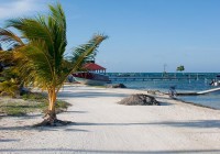 A beautiful white sand beach on the Belize island of Caye Caulker - photo courtesy of Tony.Beeman