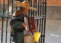 A Mexican busker playing an accordion - photo courtesy of Russ Bowling