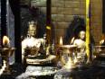 Candles and golden Buddha statues in the Golden Temple, Kathmandu