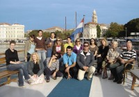 An on the go group pose for a photo on a Croatia Sailing boat