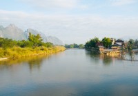 Laos' still waters in Pakse - visit them on a private Laos tour. 