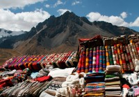Brightly coloured good at the Puno markets in Peru on our South America Tours