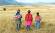 A family walking in Peru - meet the locals on our Peru Tours