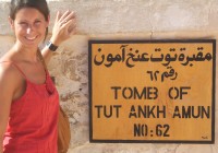 A girl standing outside the Tomb of Tutankhamen, at the Valley of the Kings in Luxor