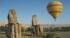 A hot air balloon by the Colossi of Memnon in Luxor