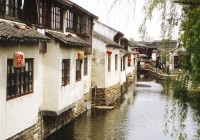 Houses with lanterns along the water canals of Suzhou in China