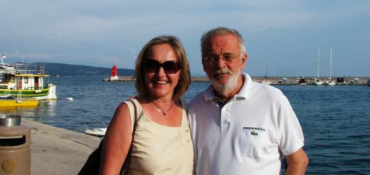 Couple standing by the Marina on the Mediterranean Caost in Turkey