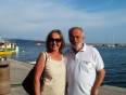 Couple standing by the Marina on the Mediterranean Caost in Turkey