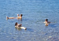 People floating in the Dead Sea in Jordan