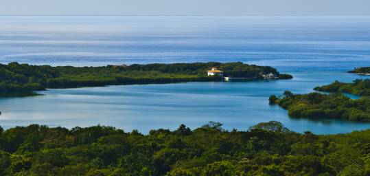 The beautiful coastline of Roatan Island off the north coast of Honduras on a Central America Tour