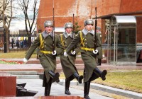 Three Russian Guards marching by the Kremlin