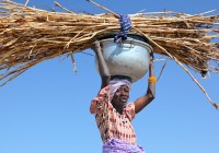 Meet the locals like this Mozambique lady on our African Safaris