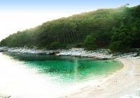 A beautiful beach with emerald green water, in Croatia