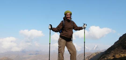 A happy trekker on the Lares Trek on one of our Peru Tours.