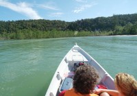 Longboat trip up the Lemenak River on a Borneo Tour.