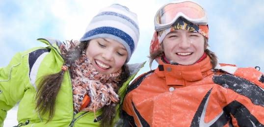 A happy couple of skiers