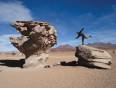 An On The Go passenger makes the most of the amzing rocks found on South America Tours