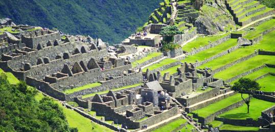The ancient Inca ruins of Machu Picchu in Peru - a must see on any Peru Tour