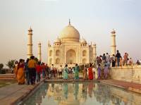 Colourfully dressed Indian people at the Taj Mahal