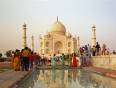 Colourfully dressed Indian people at the Taj Mahal