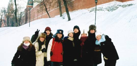 A group in winter outside the Kremlin walls in Moscow