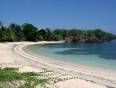 Pristine white sandy bay of Roatan Island in Honduras - relax here on a Central America tour.