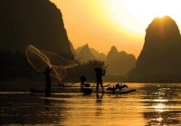Watch the Guilin fishermen and their cormorants in action on a tailor-made holiday to China
