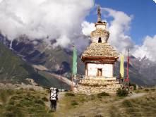 A man trekking to a Buddhist stupa in Nepal