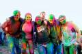 On the Go passengers covered with the bright paint used in India's Holi festival - the festival of c