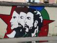 Wall paintings of Cubas Revolutionaries in Havana as seen on our Cuba Tours.