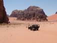 The size of a jeep compared to the size of Jebels in Wadi Rum