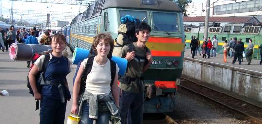 On the go travellers standing by the trans-siberian train