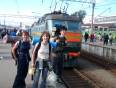On the go travellers standing by the trans-siberian train