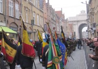 The Remembrance Day Parade marching towards the Menin Gate, Ypres, Belgium