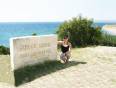 A girl next to the ANZAC Cove sign in Gallipoli