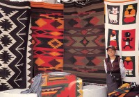 A variety of traditional Andean rugs on display at Otavalo market