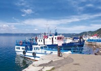Boats at a small port on Lake Baikal in Siberia