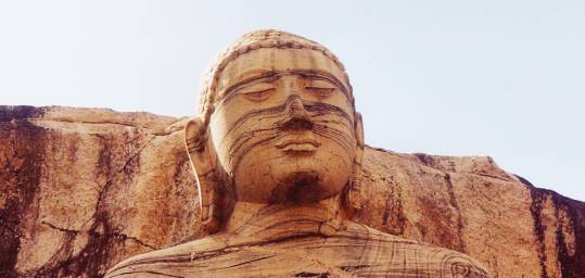 A giant Buddha at Polonnaruwa - a highlight of many of our Sri Lanka tours