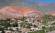 The colourful hills in Argentina surround a village. Visit here on our Argentina tours.