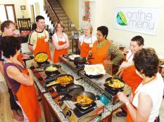 Travellers enjoying a cooking holiday with holiday on the menu