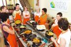 Travellers enjoying a cooking holiday with holiday on the menu