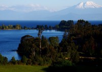 The forests and snow-capped peaks of Puerto Varas and its scenic surroundings on our Chile Tours